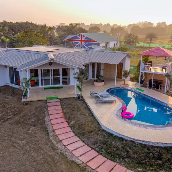 ELIVAAS Vedaaz Farms Pet-friendly 4-BHK Villa With Private Outdoor Pool and Garden area
