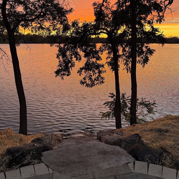 Enjoy beautiful sunsets year round from this spacious 3 BR home on Lake Orono.