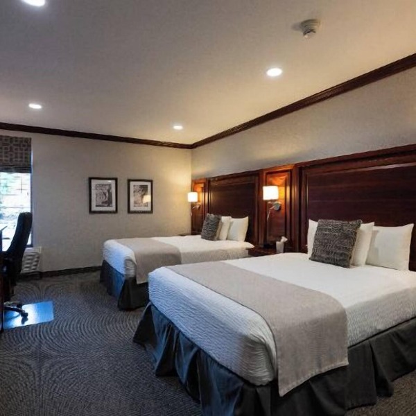 Executive Double Queen Room with Modern Amenities & Breakfast