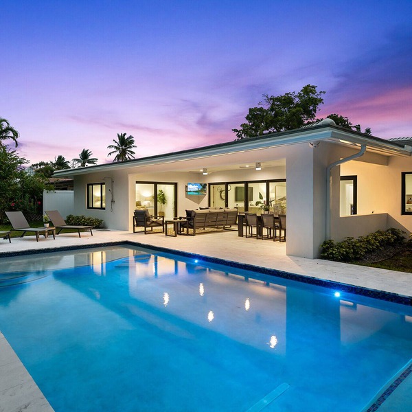 Experience Manatee Harbor, a Modern Heated Pool Getaway Near the Sand and Surf!