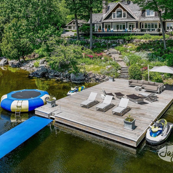 Exquisite 5 Bdrm 4 Bath Cottage with Boathouse and Professional Gym! SW Views!