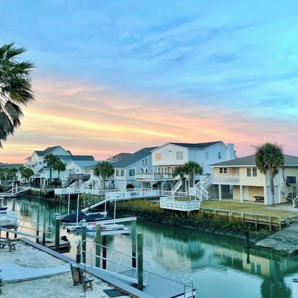 Fabulous 4-bedroom channel home with private dock in Cherry Grove Beach.