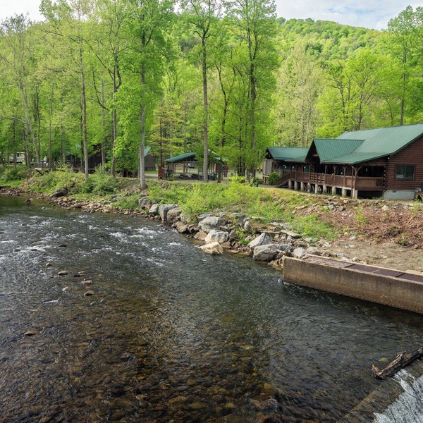 Fall Foliage Riverfront Cabin w/Hot Tub, King Bed, EV & Firepit & Mountain Views