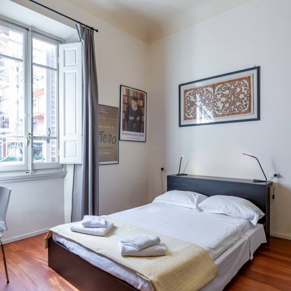 GuestHost - Charming studio apartment of about 20 sqm, able to accommodate up to 2 people, located on the raised ground floor (5 steps to access) of an ancient building in good condition. The apartment is located within Le Cure district, a quiet resident