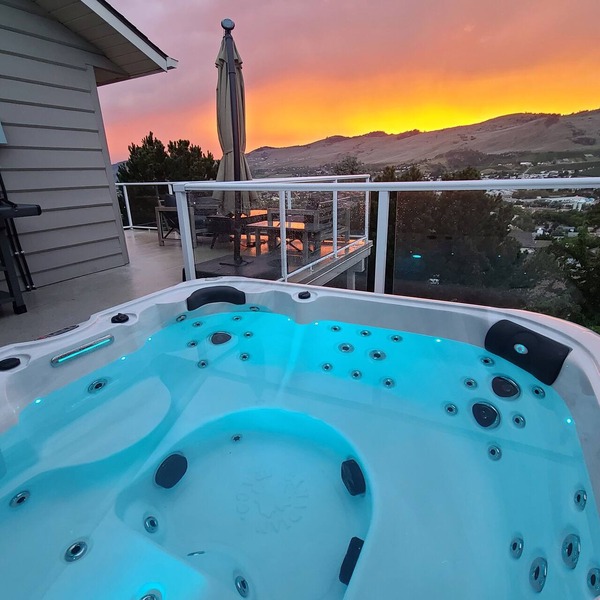 Lake views beautiful 4 bedroom , 2 living rooms home with hot tub.