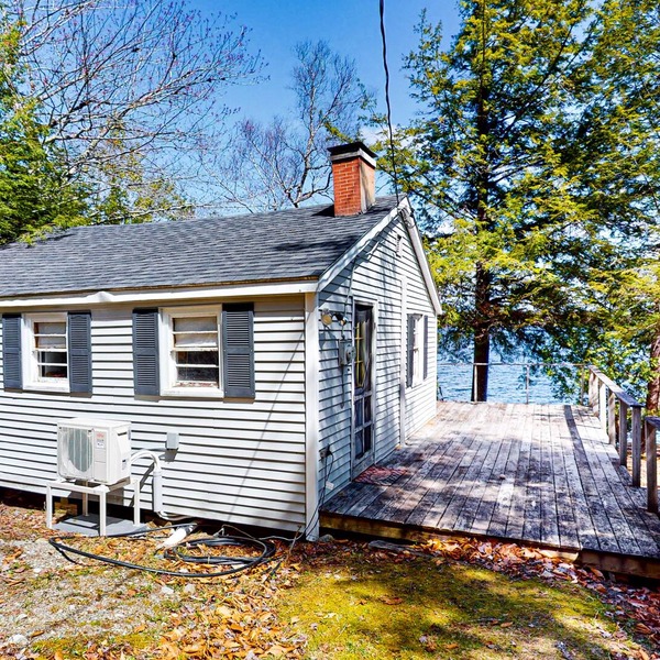 Lakefront cabin with deck, grill, screened porch, & firepit - dog-friendly