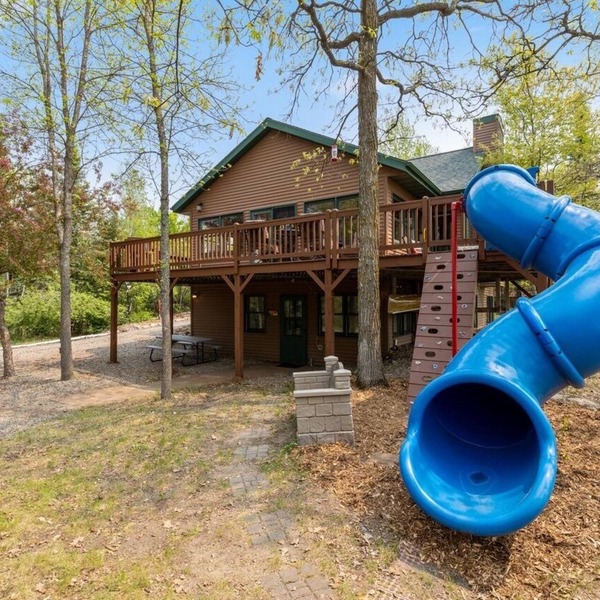 Lakefront retreat on Island Lake. Two cabins, 7 bedrooms, sand beach, privacy+