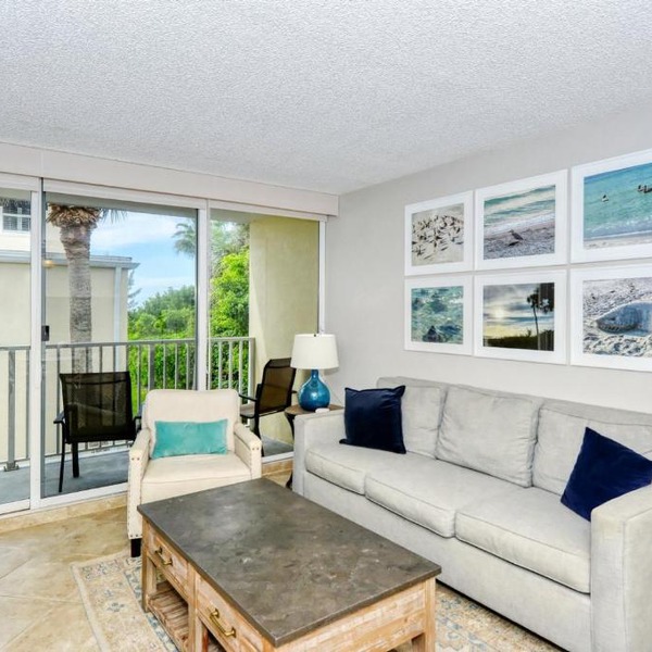 LaPlaya 202E Catch the gentle Gulf breezes on your private balcony beneath the swaying palms