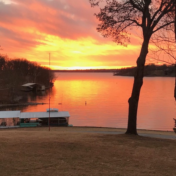 Large private acreage, very open space, decks, hot tub, treehouse, dock, more.