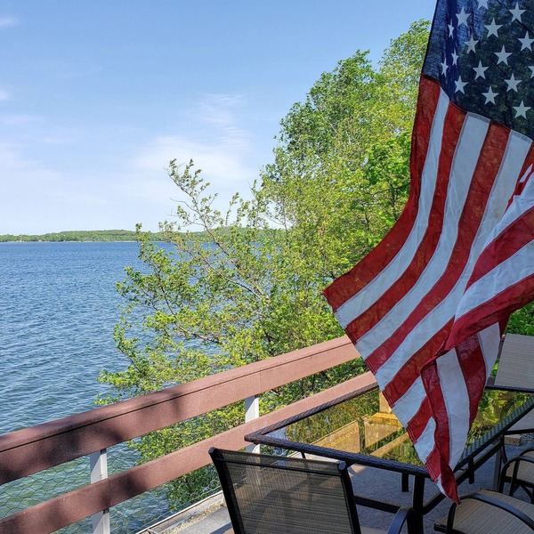 Looking for a secluded lake cabin? 5+ acres, 400’ shoreline on Stuart Lake!