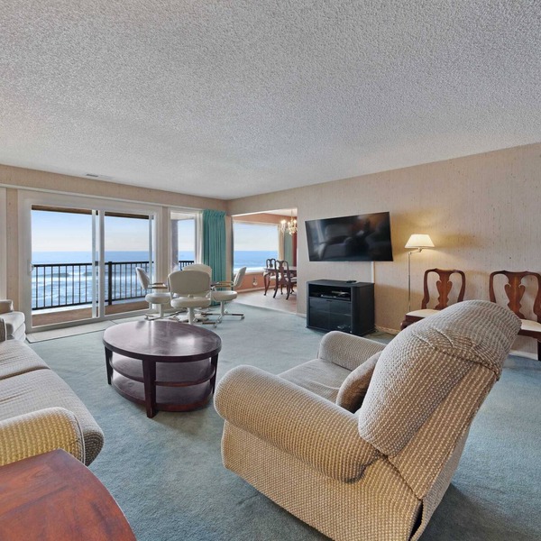 Lovely oceanfront condo with sweeping water views and balcony