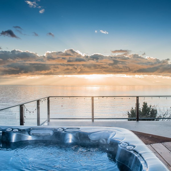 Lovely Waterfront Beach Haven with Hot Tub & SUP
