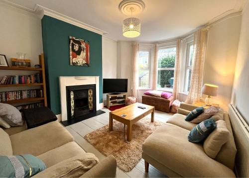 Luxe cottage-style retreat with garden – sleeps 12
