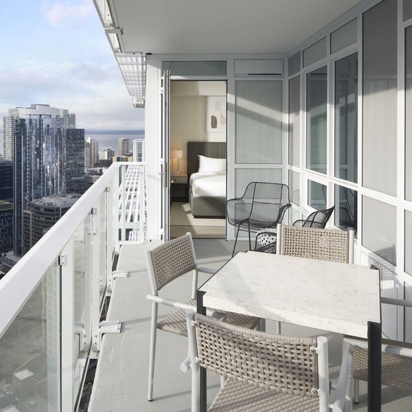 Luxury 2-BR Sky Suite with Stunning Views, Pools, & Top Seattle Amenities