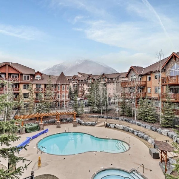 Luxury 2BR KING/2BTH condo - Outdoor heated pool and hot tub - mountain views