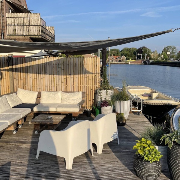 Luxury (holiday) home, Amsterdam, on the water incl. Use of motor sloop
