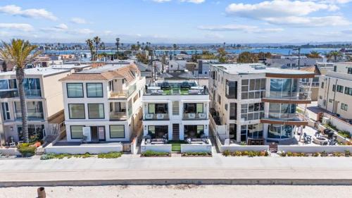 Luxury oceanfront fourplex with roof deck sleeps 22