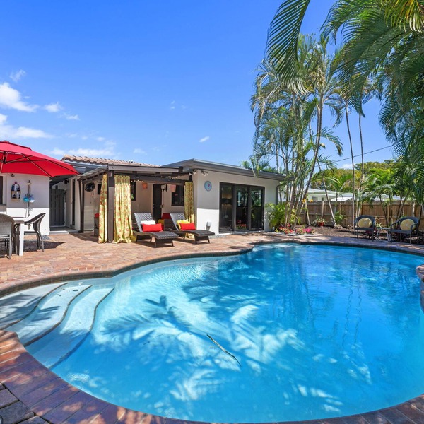 Martini Manor is the ultimate Tropical Oasis with a private Heated Pool!