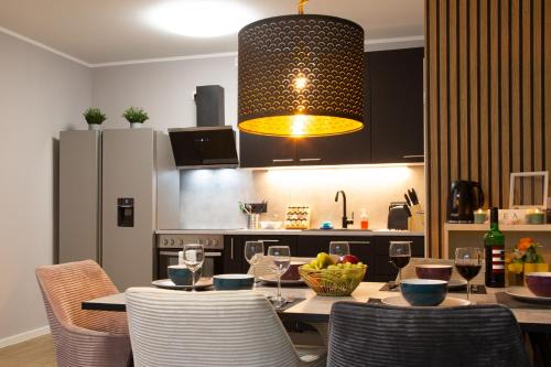 MiCasa OL - Modernes Apartment in City Bestlage - Küche - WLAN - Balkon - Fugenloses Bad - E Ladesäule