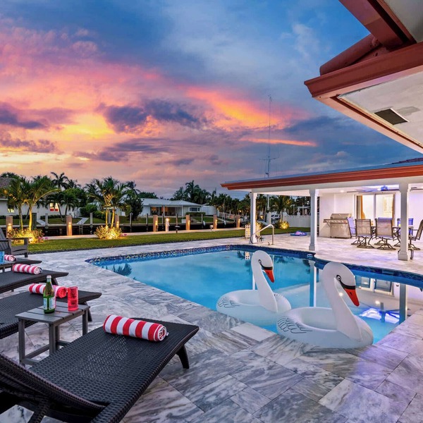 Mid-Century Modern Waterfront Pool Home Near Beach
