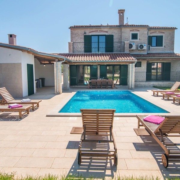 Minimalistically decorated villa Pomer with private pool and fenced yard