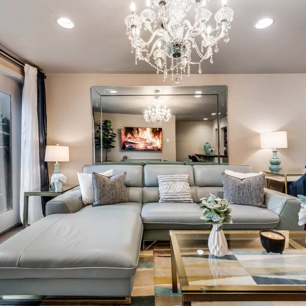 Modern 2BR, 2BA luxury condo in central Dallas with private patio, designer interiors, and access to award-winning courtyard retreat.