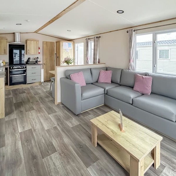 Modern and contemporary 12ft wide caravan with one double and one twin.
