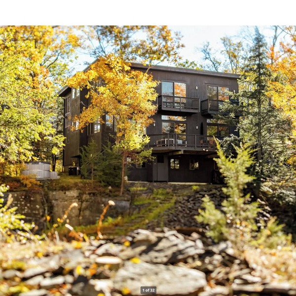Modern interiors with beautiful view of mountains and a private bluestone quarry