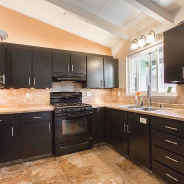 Monterey craftsman style home with vaulted exposed-beams ceiling hardwood floor