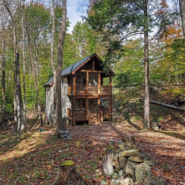 Mountain Stone Cabin by Creek with Hot Tub; 7 Mins to Skiing & Hiking