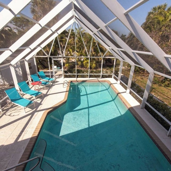 Naples Beach Escape | Pool, Canal Views & Tiki Vibes Near Pier & 5th Avenue