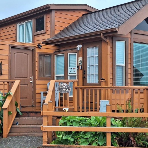 Ocean Cabin 23 is a cozy seaside bungalow with loft, limited ocean views, and private beach.