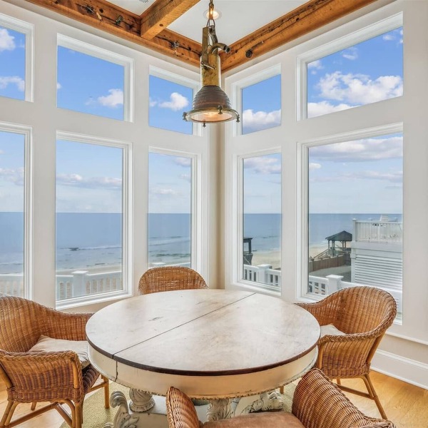 Oceanfront 8BR Corolla retreat with pool, hot tub, and beach access.