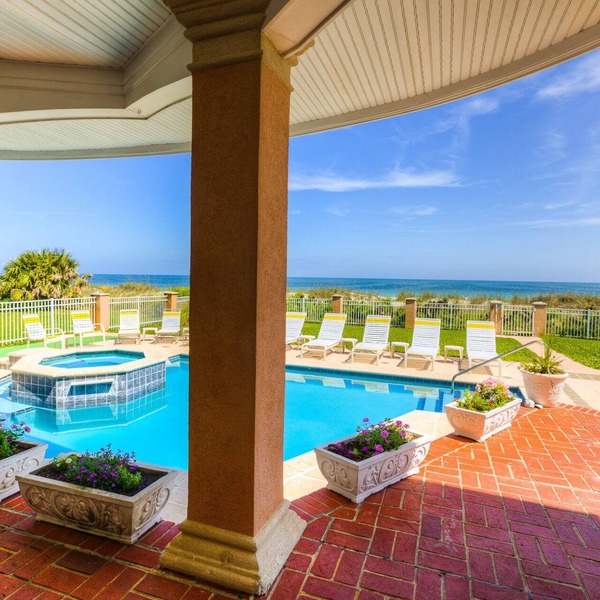 Oceanfront duplex with pool spa putting green walkway to beach