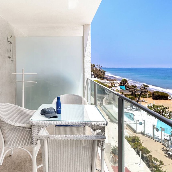 Oceanfront Gem w/Balcony, Pool, Hot Tub & Carbon Beach Access | Bluewater Haven