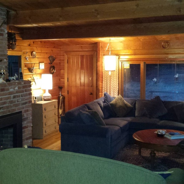 Oceanfront log cabin with sweeping ocean, mountain and sunset vistas