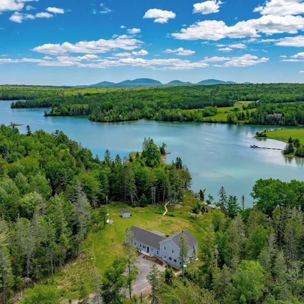 Oceanfront, mobility-minded home: dock, kayaks, views, hot tub, fire pit + games