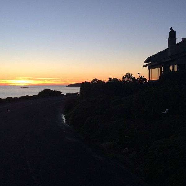 ON A BLUFF WITH 180 DEGREE CLOSE WATER VIEWS SHORT WALK TO THE BEACH