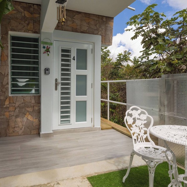 Peaceful cozy studio w a/c with breezy views, private patio & intimate space.