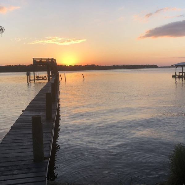 Peaceful Waterfront Home on St. Johns with large porch and dock.
