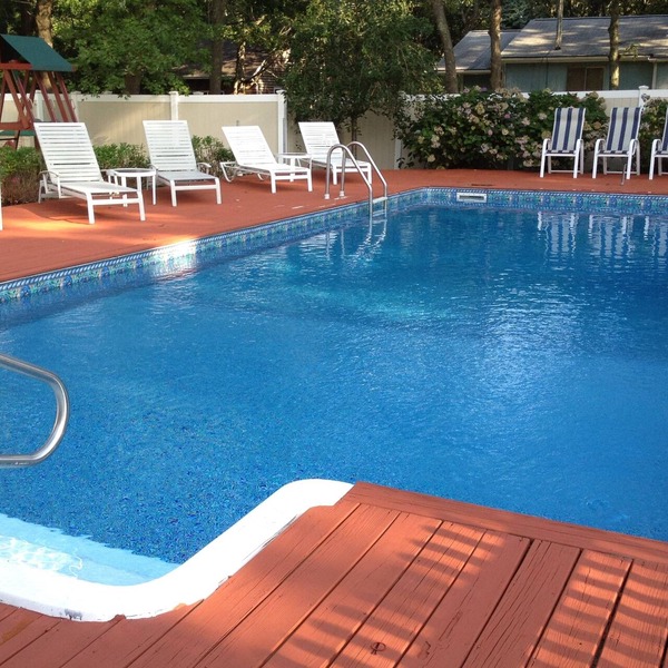 Pet Friendly! Spacious town house style open concept. Salt Water Pool & HotTub