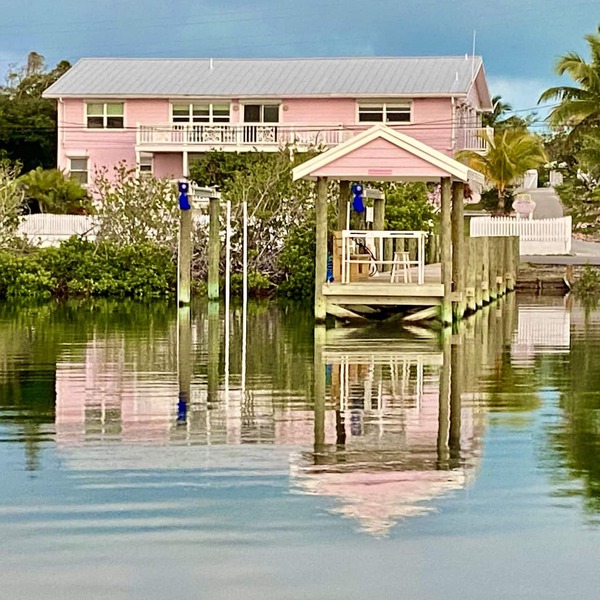 Pink Bikini Island Cottage with a dock on Black Sound