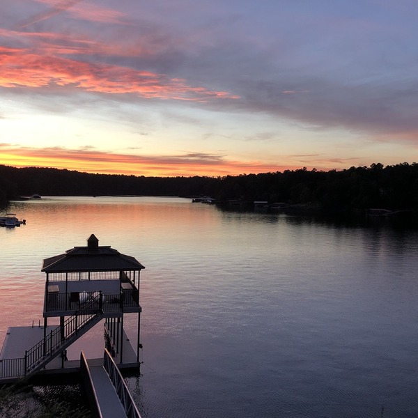 Point lot w/beautiful views! Deep water, 2-story dock, min steps to water.
