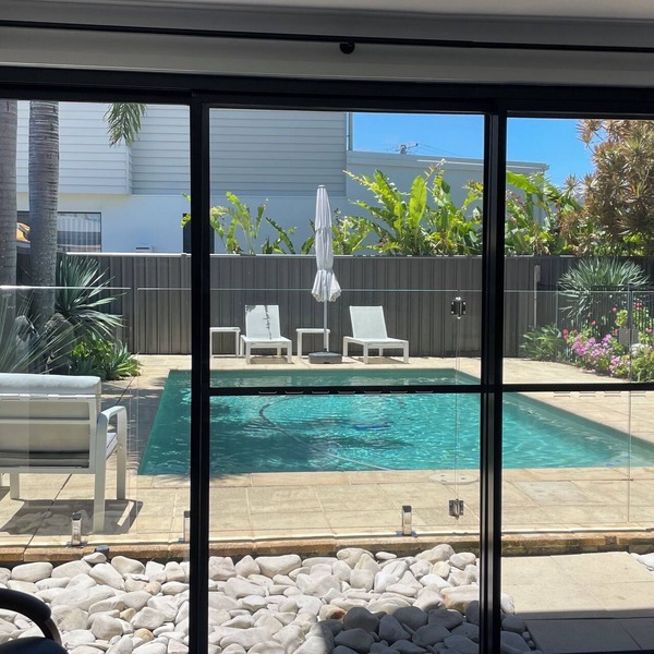Poolside self contained unit walk to beach