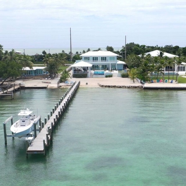 Private Beach Bayside 6 Bedroom Resort Home with Pool, Dock, & Garage
