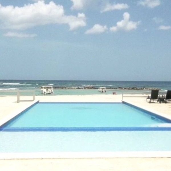 Private Beachfront Property with access to private pool, hot tub and beach!