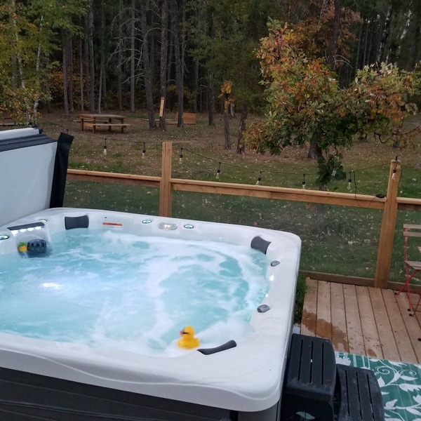 Private cottage with guest cabin, RV Hookup, and hot tub near Whitemouth Lake