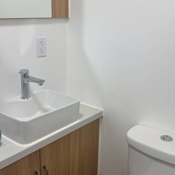 Private Duplex Studio Suite with Queen Bed, Kitchenette and Private Bathroom.