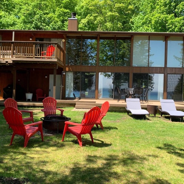 Private Lakefront Suttons Bay Home with Hot Tub, Newly Renovated Beach and A/C!