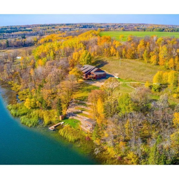 Private, Spacious, 10,000 Sq Ft Custom Built Lake Home w/Lakeside Cabin & 73 ac